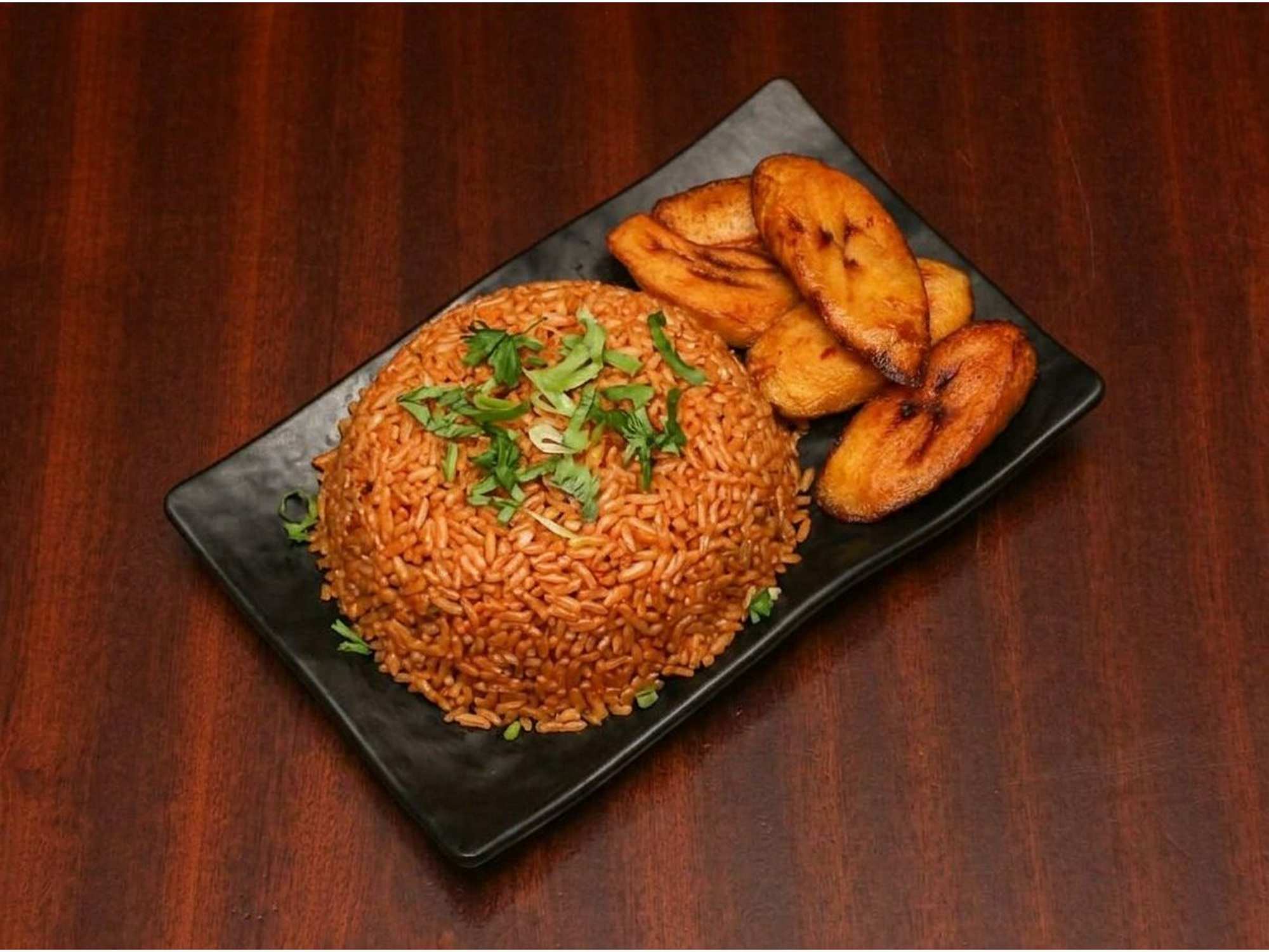 Smoky jollof rice with fried plantain